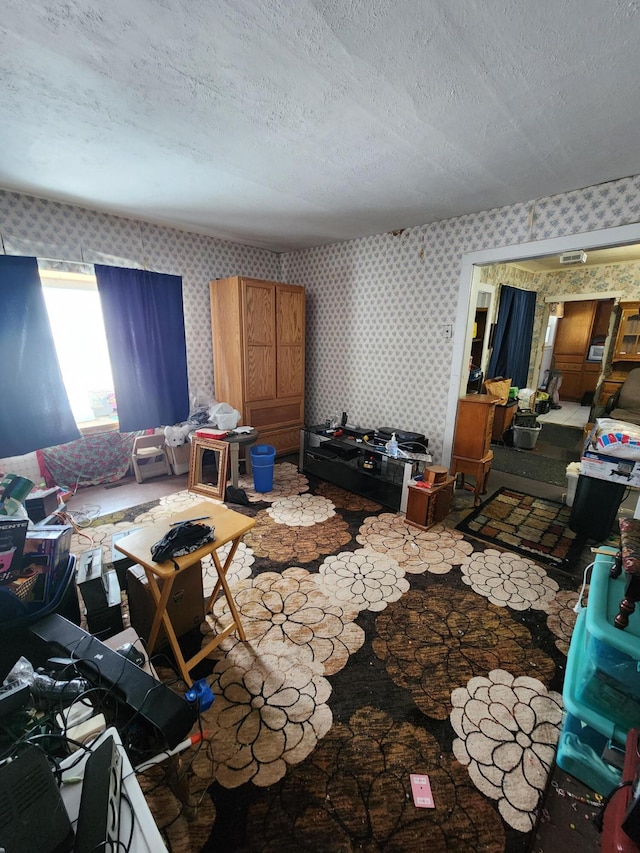 living room with a textured ceiling