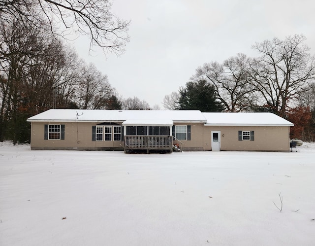 view of snow covered property