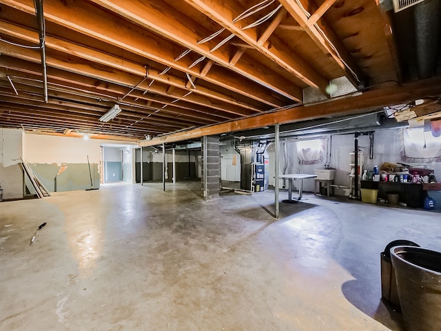 basement featuring heating unit