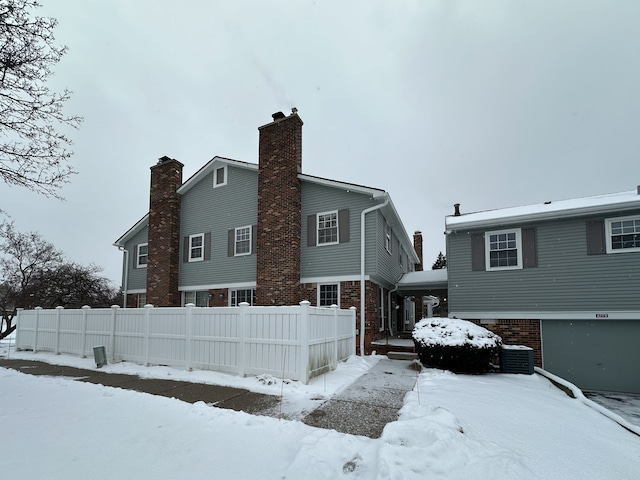 view of snow covered house