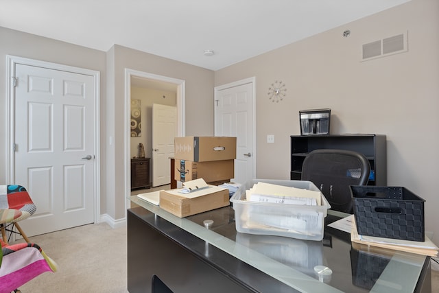 home office with light colored carpet