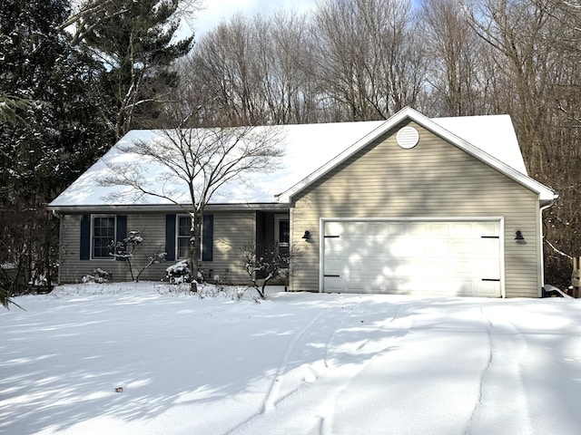 single story home featuring a garage