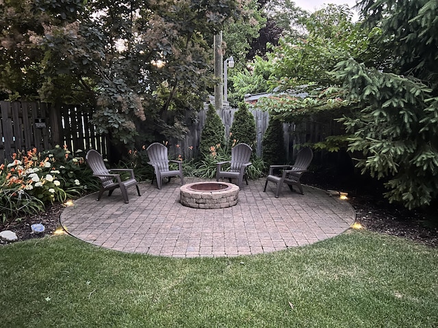 view of patio featuring an outdoor fire pit