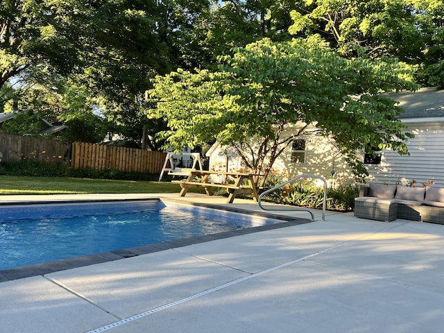 view of swimming pool with a patio area and outdoor lounge area