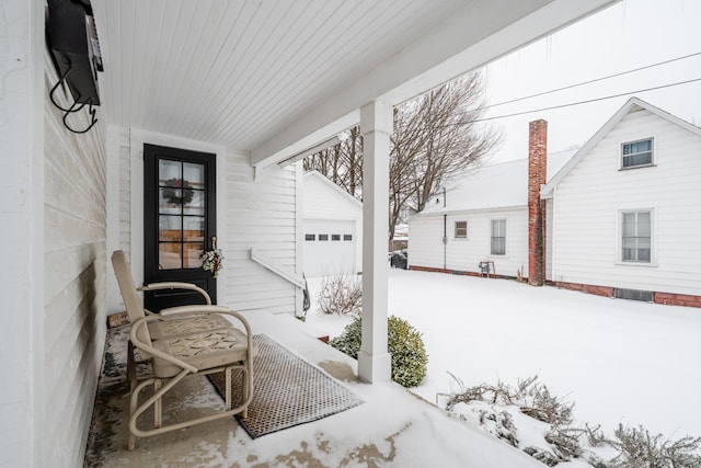 view of snow covered patio