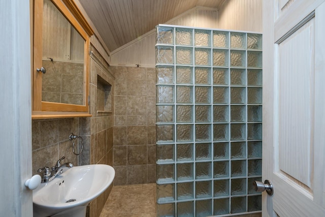 bathroom featuring sink, wooden ceiling, walk in shower, tasteful backsplash, and vaulted ceiling