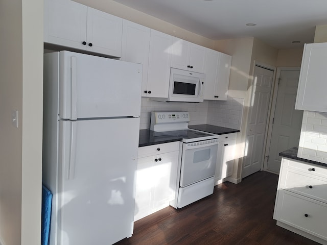 kitchen featuring white appliances, decorative backsplash, white cabinetry, and dark wood-type flooring