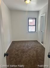 view of carpeted spare room