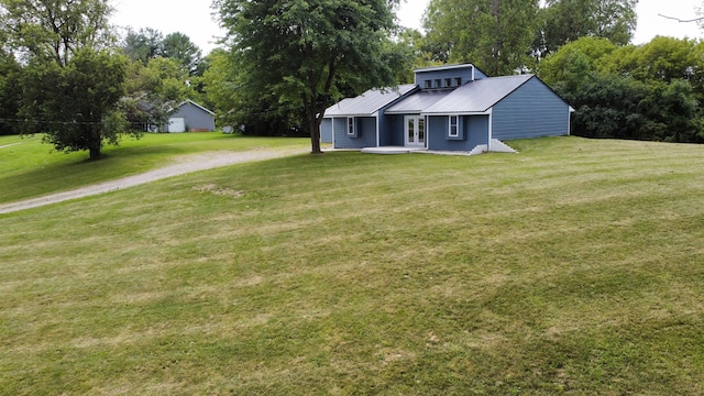 view of front of home featuring a front lawn