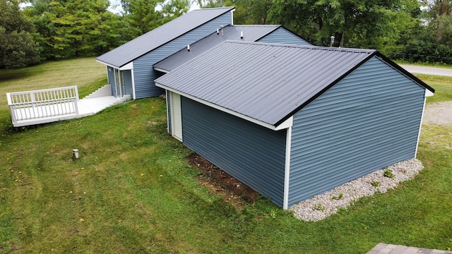 view of outdoor structure with a yard