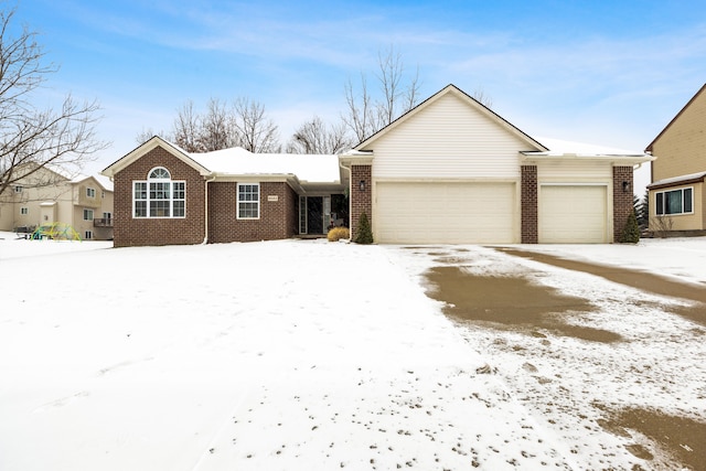 ranch-style house featuring a garage