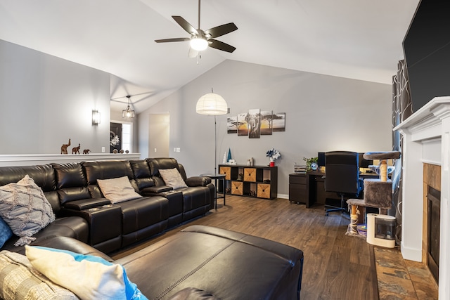 living room featuring a fireplace, ceiling fan, vaulted ceiling, and dark wood-type flooring