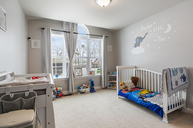 bedroom with multiple windows and carpet floors