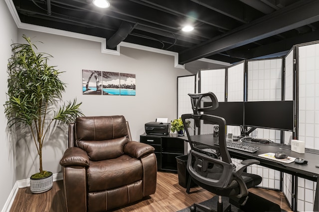 office featuring ornamental molding, hardwood / wood-style floors, and beamed ceiling