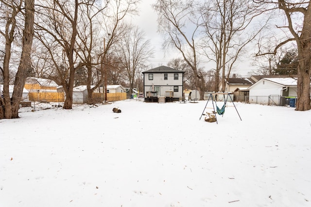 view of yard layered in snow