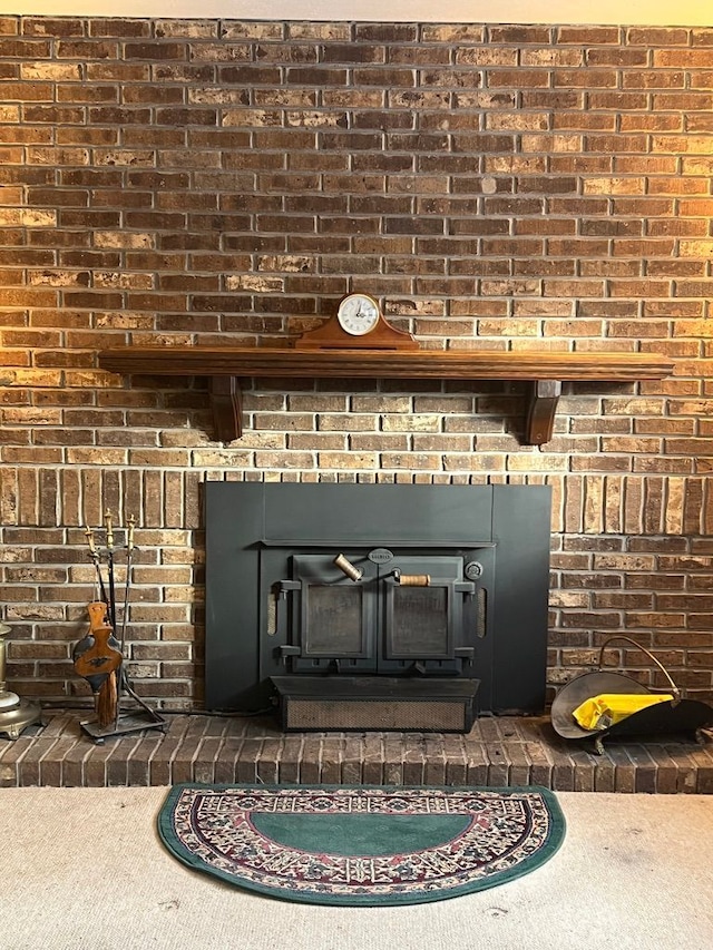 interior details featuring a wood stove