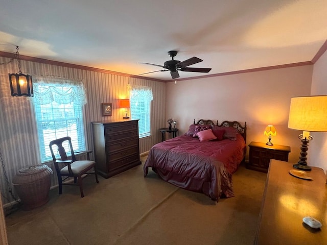 bedroom featuring ornamental molding, ceiling fan, and carpet flooring