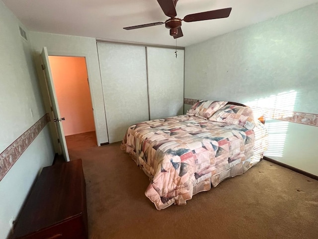 bedroom featuring carpet flooring, ceiling fan, and a closet