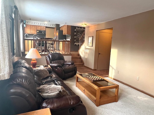 living room with light colored carpet