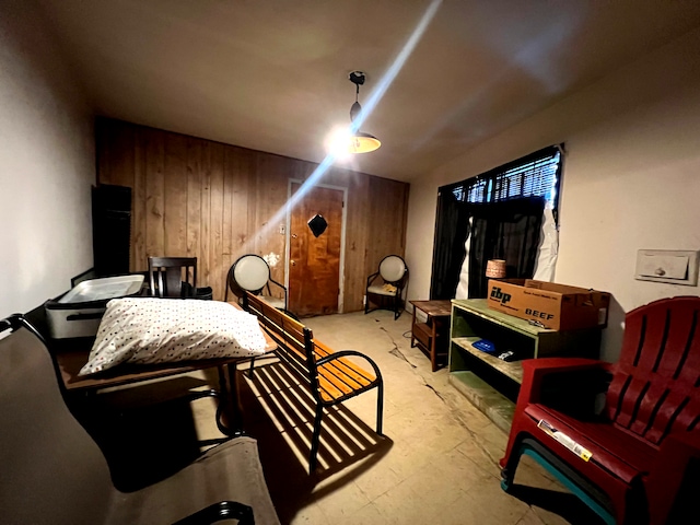 sitting room with wood walls