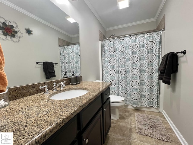 bathroom with crown molding, vanity, and toilet