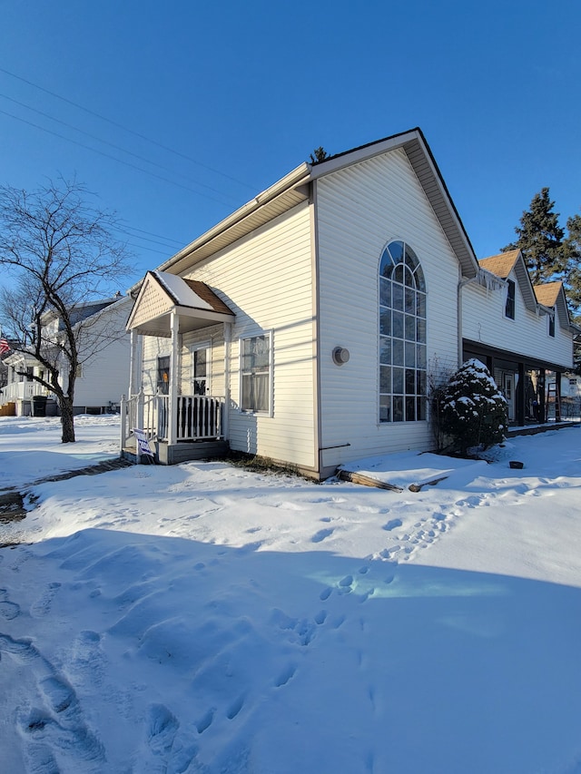 view of snow covered property