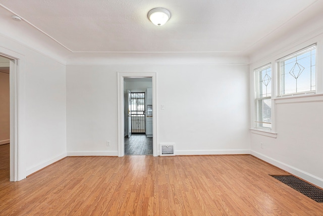 empty room featuring light wood-type flooring