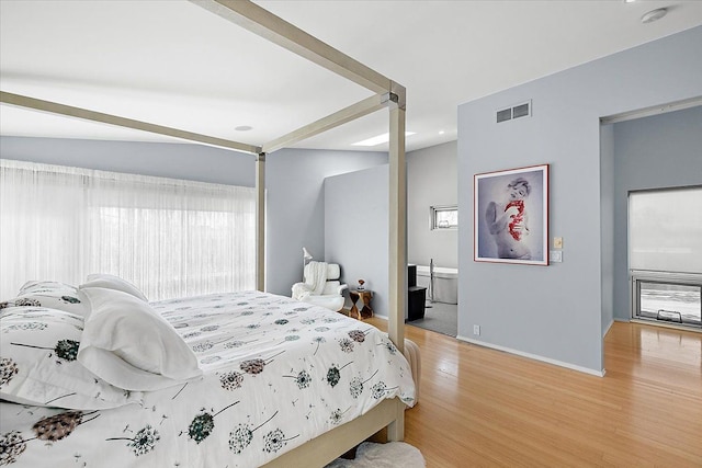 bedroom featuring hardwood / wood-style flooring