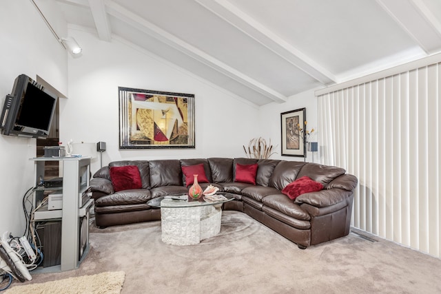 carpeted living room with vaulted ceiling with beams