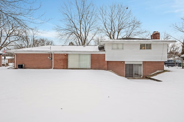 view of snow covered property