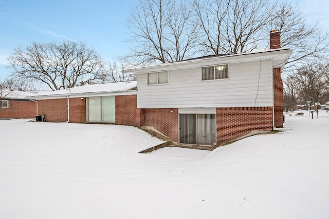 view of snow covered property