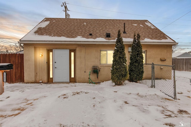 view of snow covered property