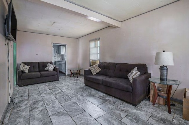 living room featuring beam ceiling