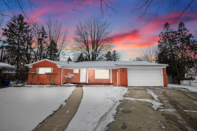 ranch-style home with a garage