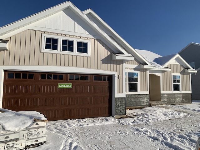 view of front of property with a garage