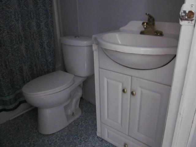 bathroom with vanity and toilet