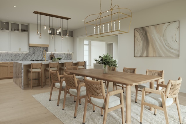 dining area with recessed lighting and light wood-type flooring