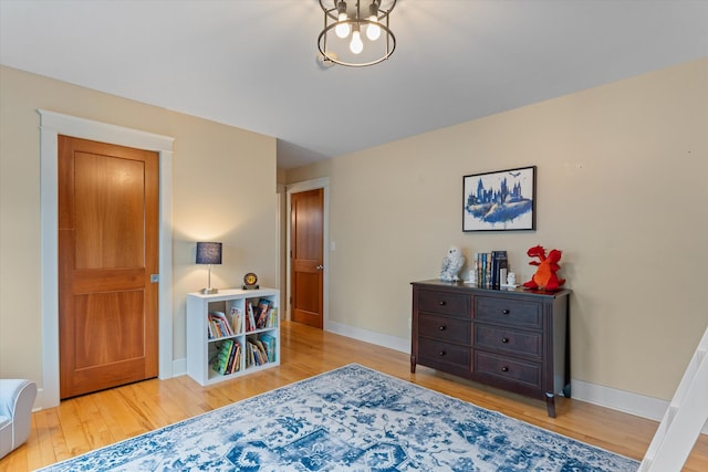 living area with light hardwood / wood-style floors