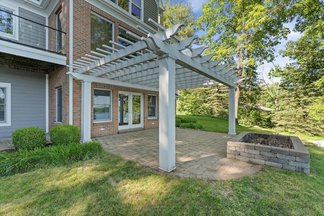 view of patio with a pergola and french doors