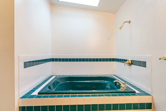 bathroom with tiled bath