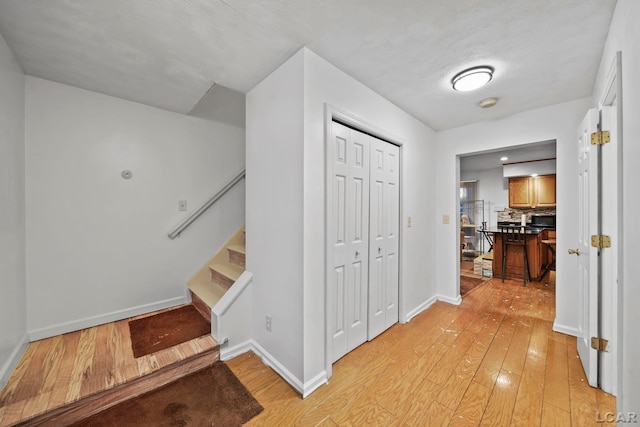 hall featuring light wood-type flooring