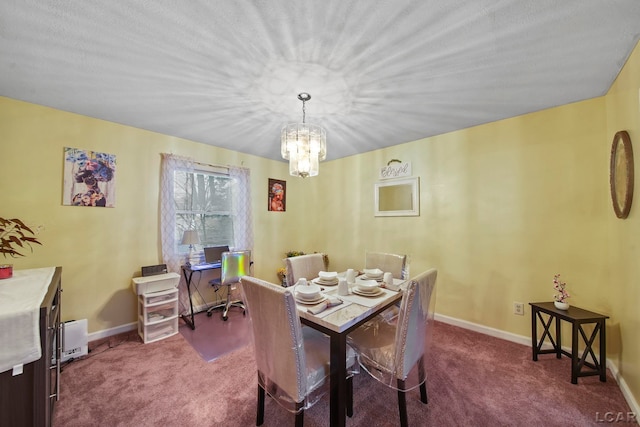 dining area featuring carpet and a notable chandelier