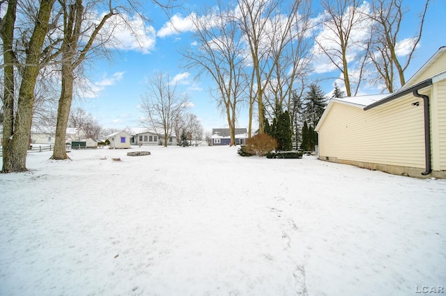 view of snowy yard