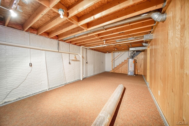 basement with carpet and water heater