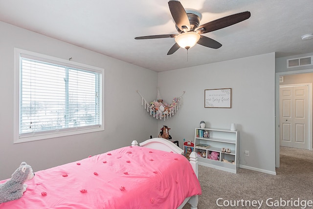 carpeted bedroom with ceiling fan