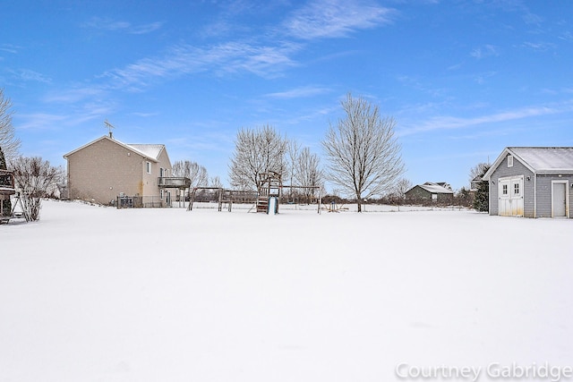 view of yard covered in snow