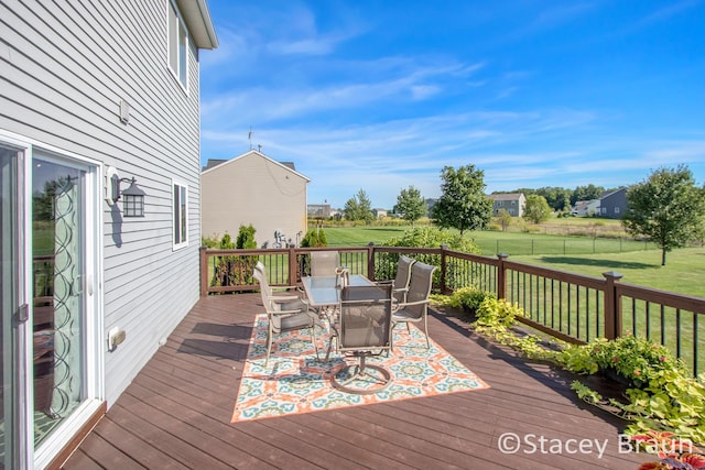 deck featuring a yard