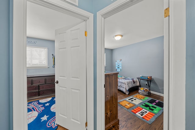 hallway featuring hardwood / wood-style flooring