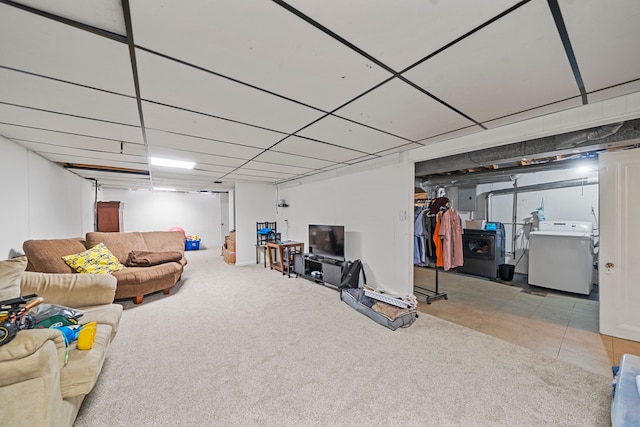 basement with washer / dryer, electric panel, and light carpet