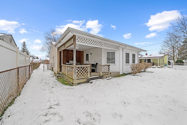 view of snow covered property